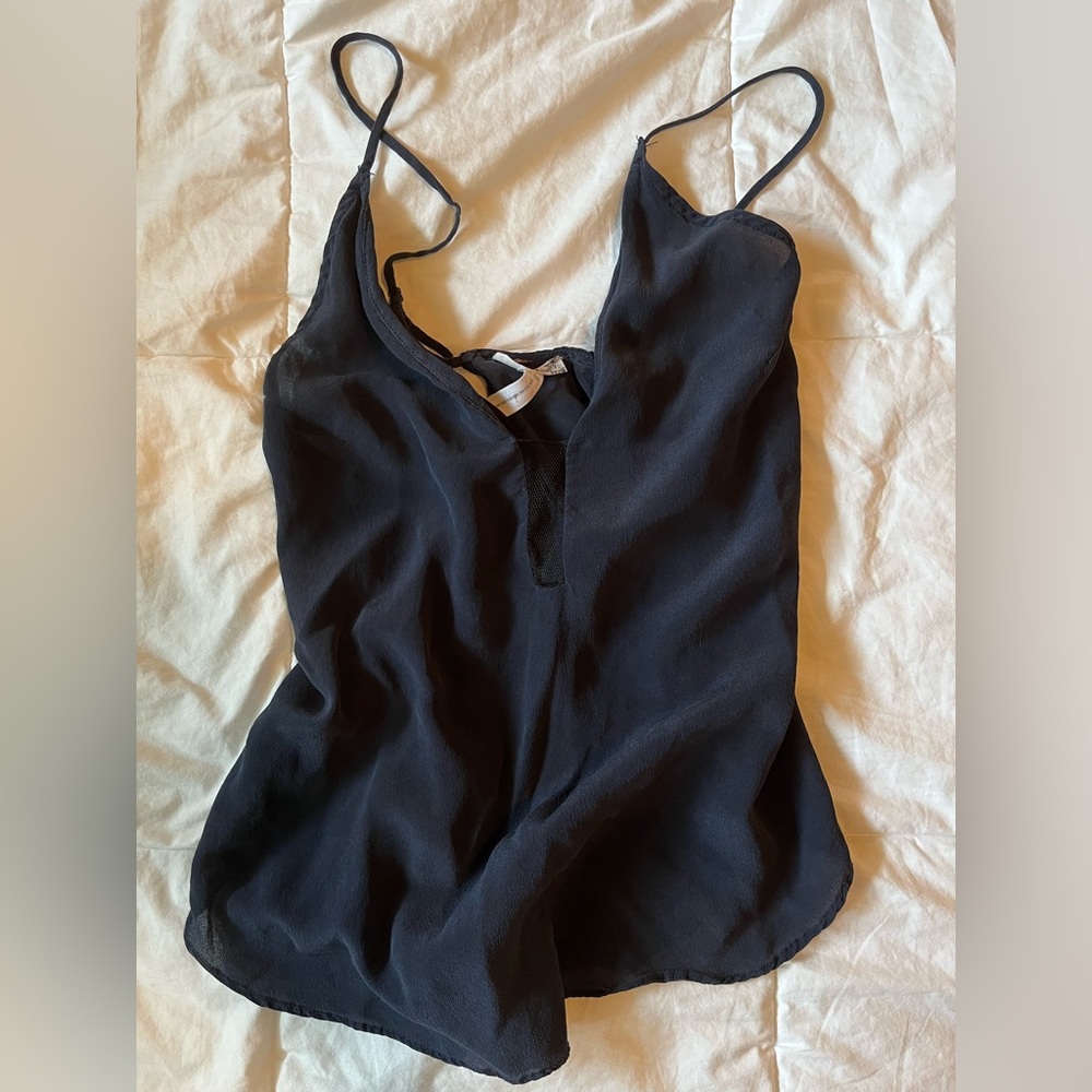 Cross back, free people spaghetti strap tank top.